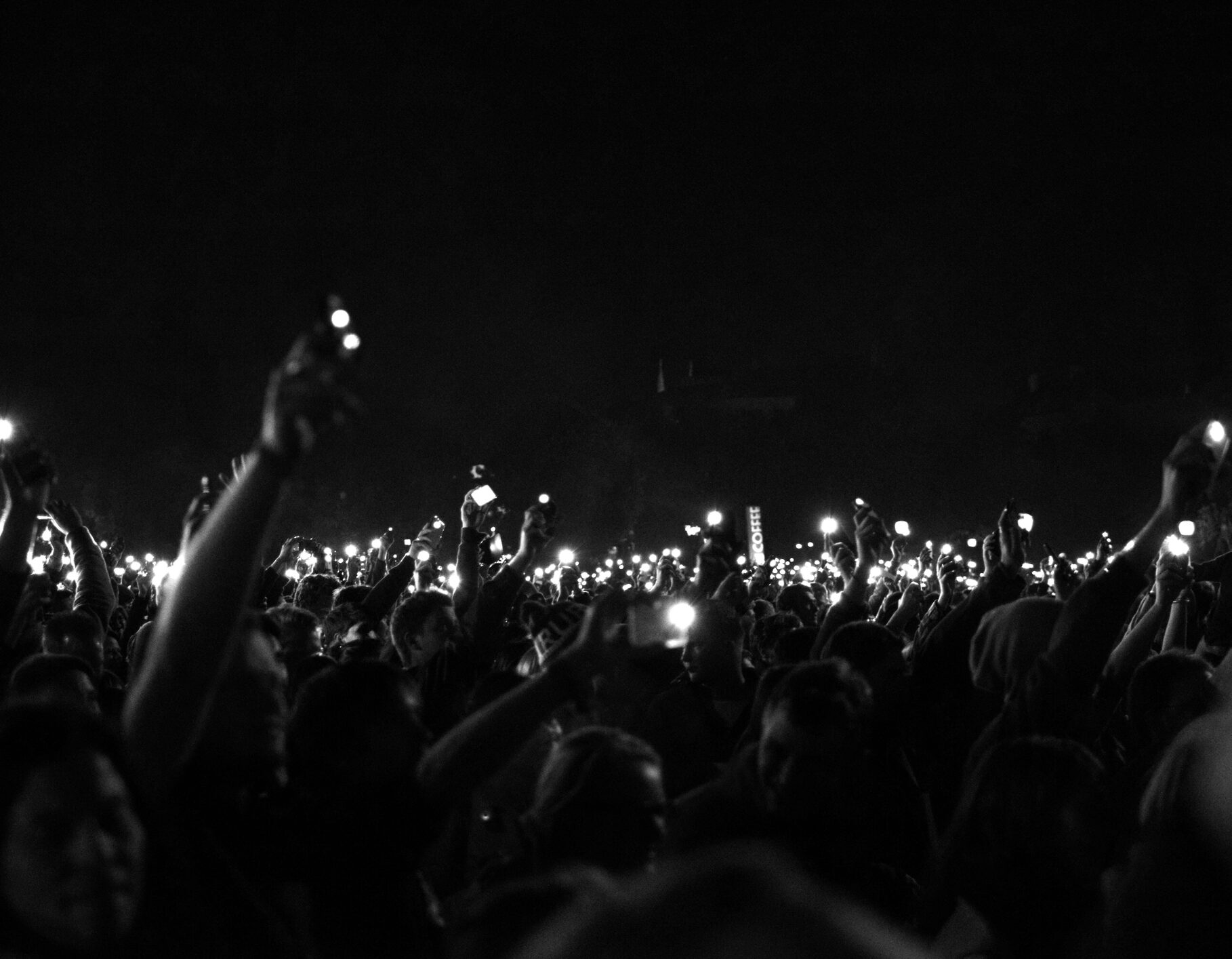 Crowd with Gathered with Phone Raised During Night