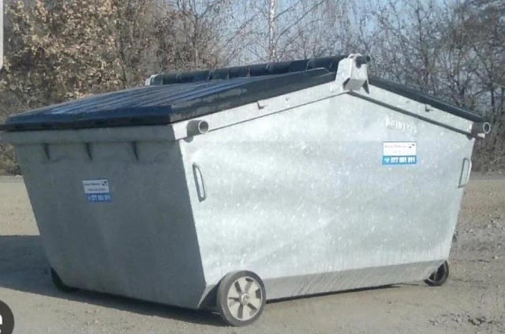 Metal garbage bin on wheels